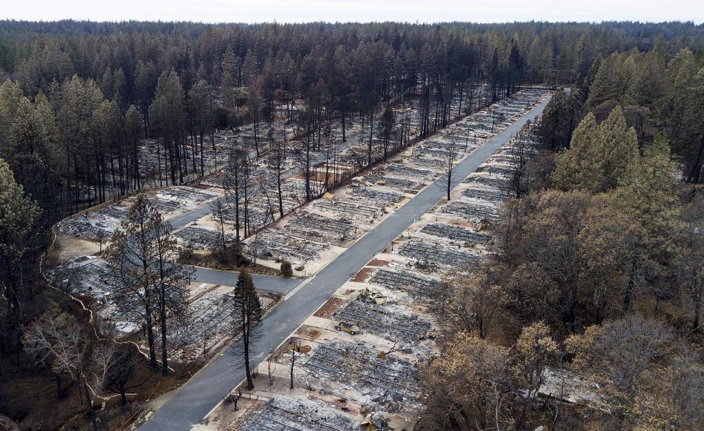 Homes leveled by the Camp Fire line the Ridgewood Mobile Home Park retirement community in Paradise, Calif., on Monday, Dec. 3, 2018. (AP Photo/Noah Berger)