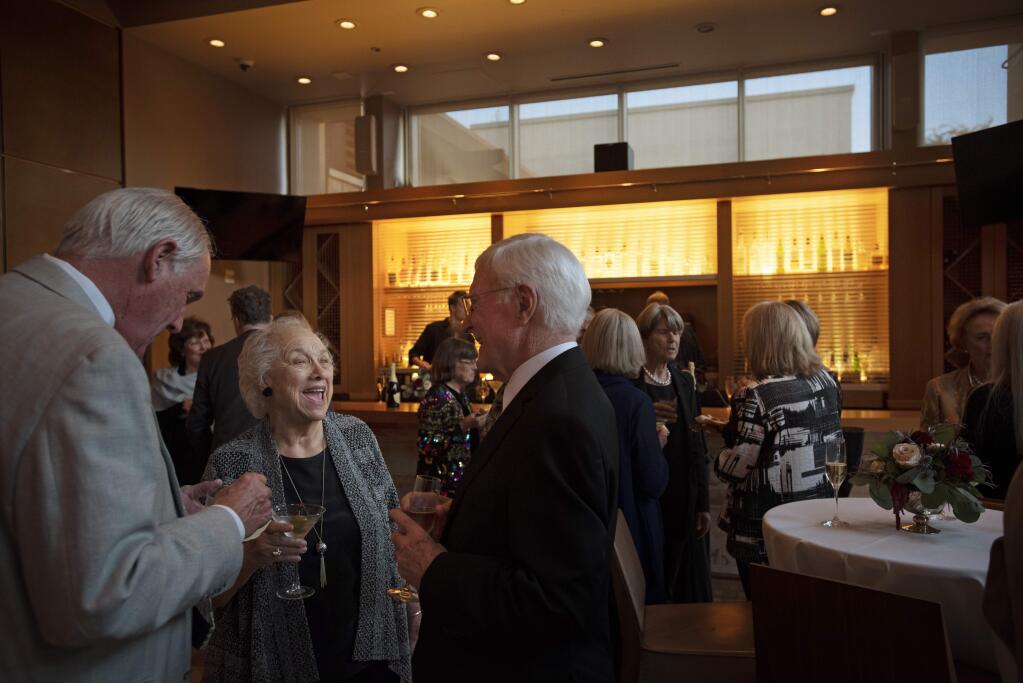 Gaye LeBaron having a laugh with Howard Dalton, left, and Larry Simons during an evening to honor long time columnist for The Press Democrat and local historian Gaye LeBaron at the Green Music Center in Rohnert Park, California. The event was hosted by the Santa Rosa Symphony. October 4, 2019.(Photo: Erik Castro/for The Press Democrat)