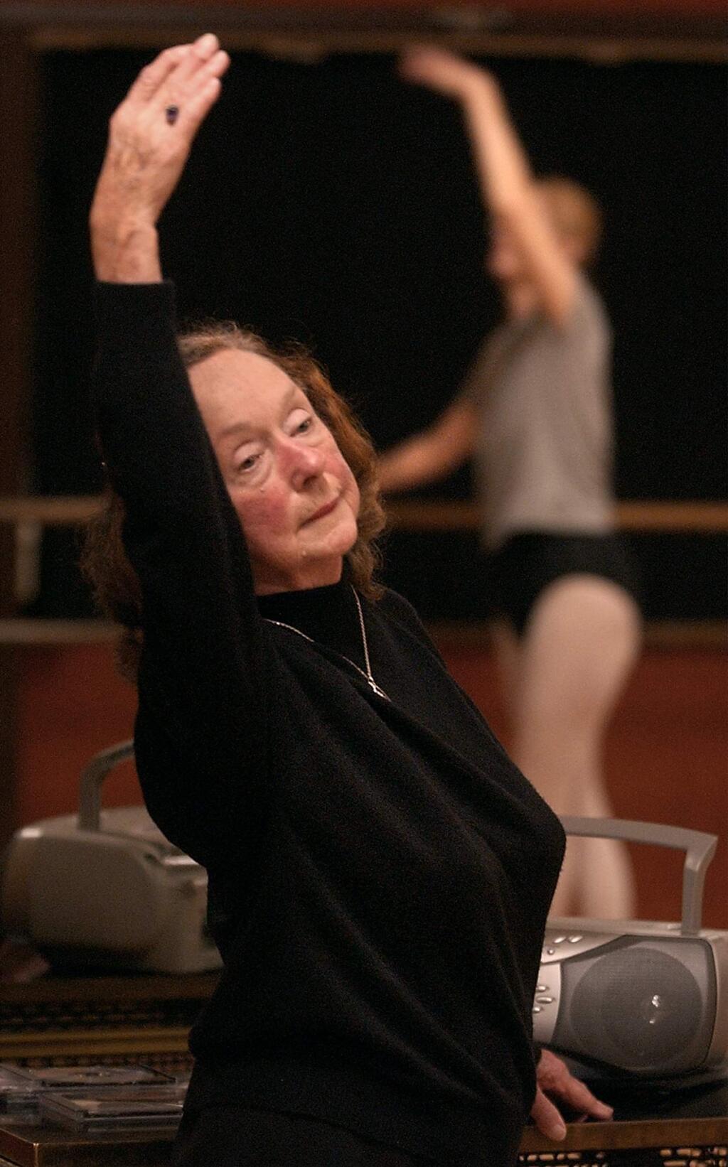 John Burgess / The Press Democrat, 2002Emily Stubbs, left, goes through the moves in front of her ladies ballet class.