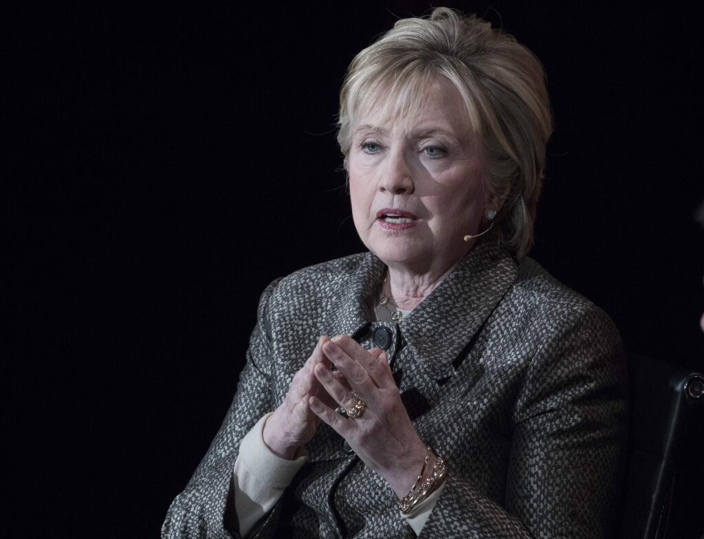 FILE - In this April 6, 2017, file photo, former Secretary of State Hillary Clinton speaks in New York. The Justice Department's internal watchdog is expected to criticize the FBI's handling of the Clinton email investigation, stepping into a political minefield as it details how a determinedly non-partisan law enforcement agency came to be entangled in the 2016 presidential race. President Donald Trump will look to the inspector general report to provide a fresh line of attack against the FBI's two former top officials, Director James Comey and his deputy, Andrew McCabe, as he claims that a politically tainted bureau tried to undermine his campaign and, through the Russia investigation, his presidency. (AP Photo/Mary Altaffer, File)