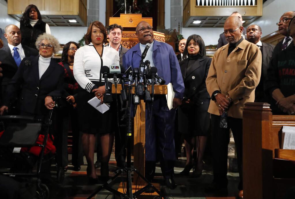 The Rev. Wendell Anthony, president of the Detroit Branch of the NAACP speaks at a rally in Detroit, Monday, Dec. 4, 2017. Clergy, Detroit elected leaders and community activists are calling for due process in support of U.S. Rep. John Conyers, D-Mich., who faces allegations of sexual harassment from several women who once worked for him. (AP Photo/Paul Sancya)