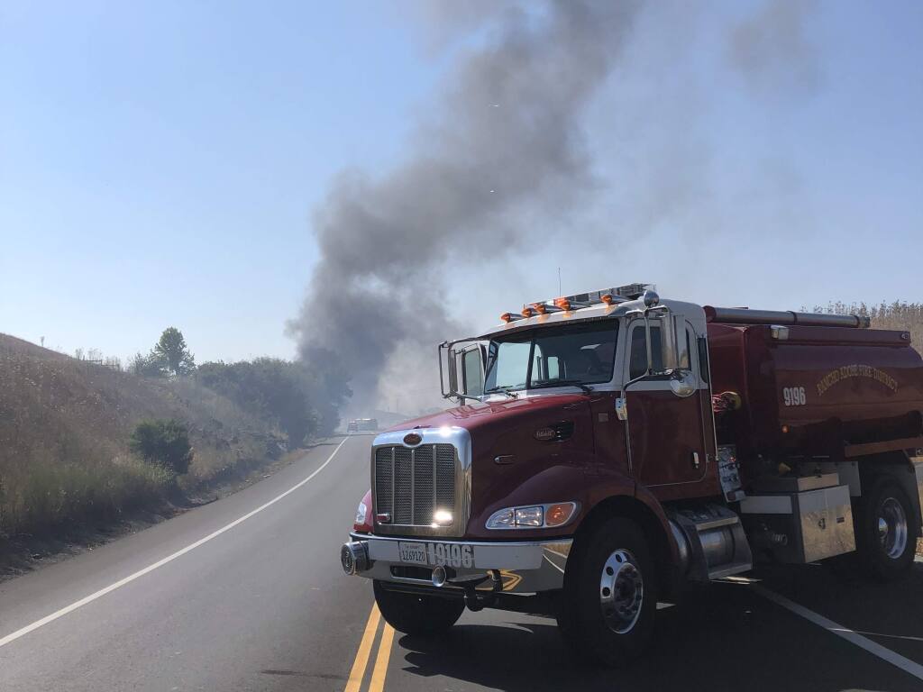 A big rig pulling an empty trailer ran off the side of Old Adobe Road east of Petaluma on Thursday, Aug. 30, 2018. (COURTESY OF RANCHO ADOBE FIRE)
