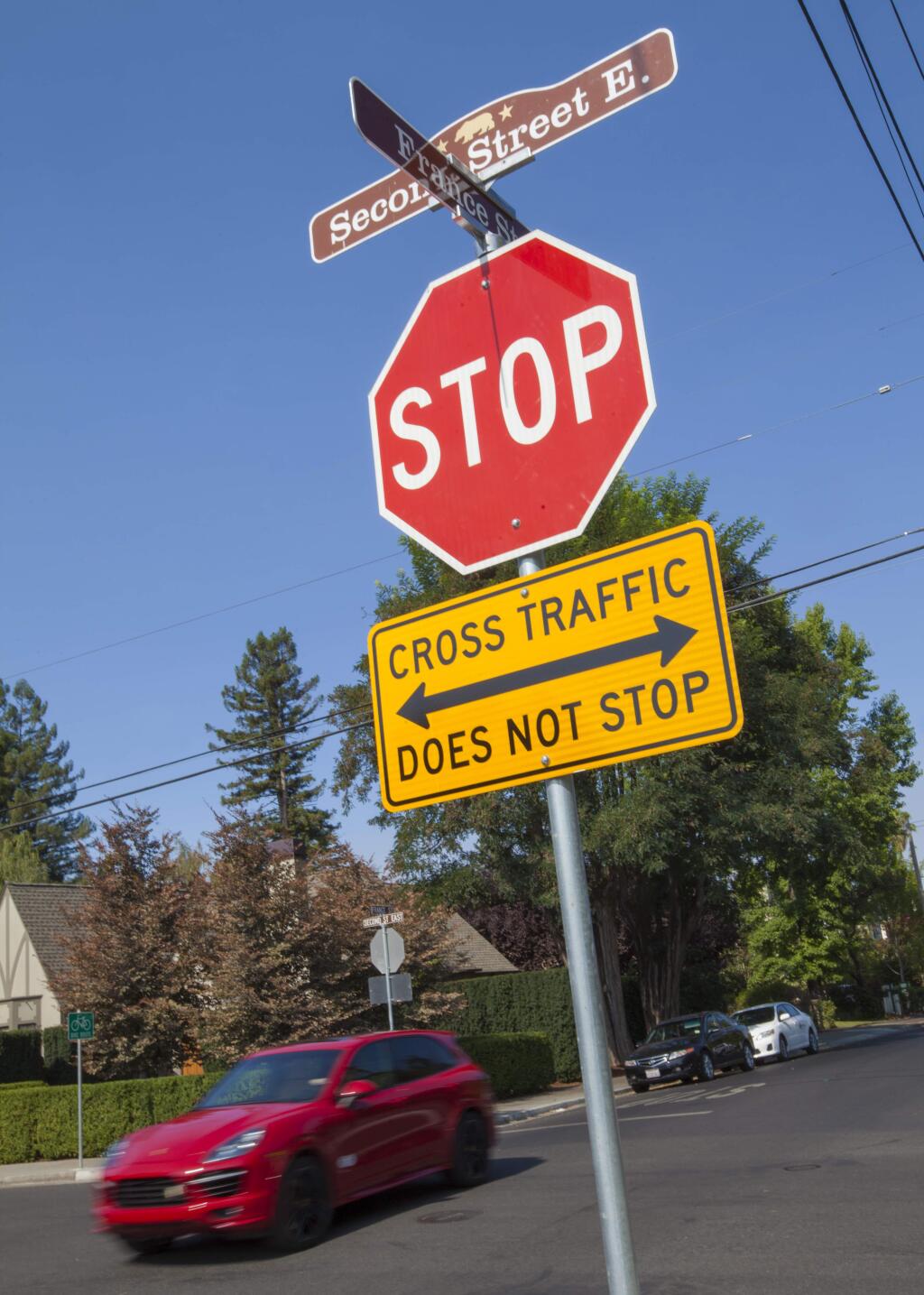 The stop sign at East Second and France streets warns drivers and pedestrians of potential cross-traffic flow. (Photo by Robbi Pengelly/Index-Tribune)