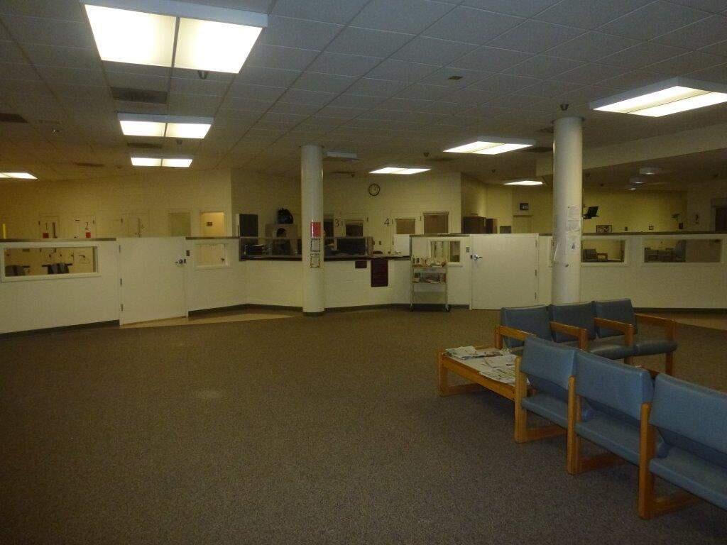 The mental health module of the 32-bed mental health unit at the Sonoma County Jail in Santa Rosa. Observation cells are visible in background, with a deputies' work station in center and activity space in the foreground. (Courtesy of the Sonoma County Sheriff's Office)