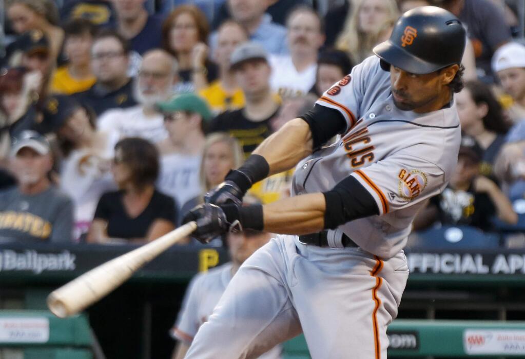 San Francisco Giants' Angel Pagan hits a grand slam off Pittsburgh Pirates starting pitcher Wilfredo Boscan during the fourth inning of a baseball game, Tuesday, June 21, 2016, in Pittsburgh. (AP Photo/Keith Srakocic)