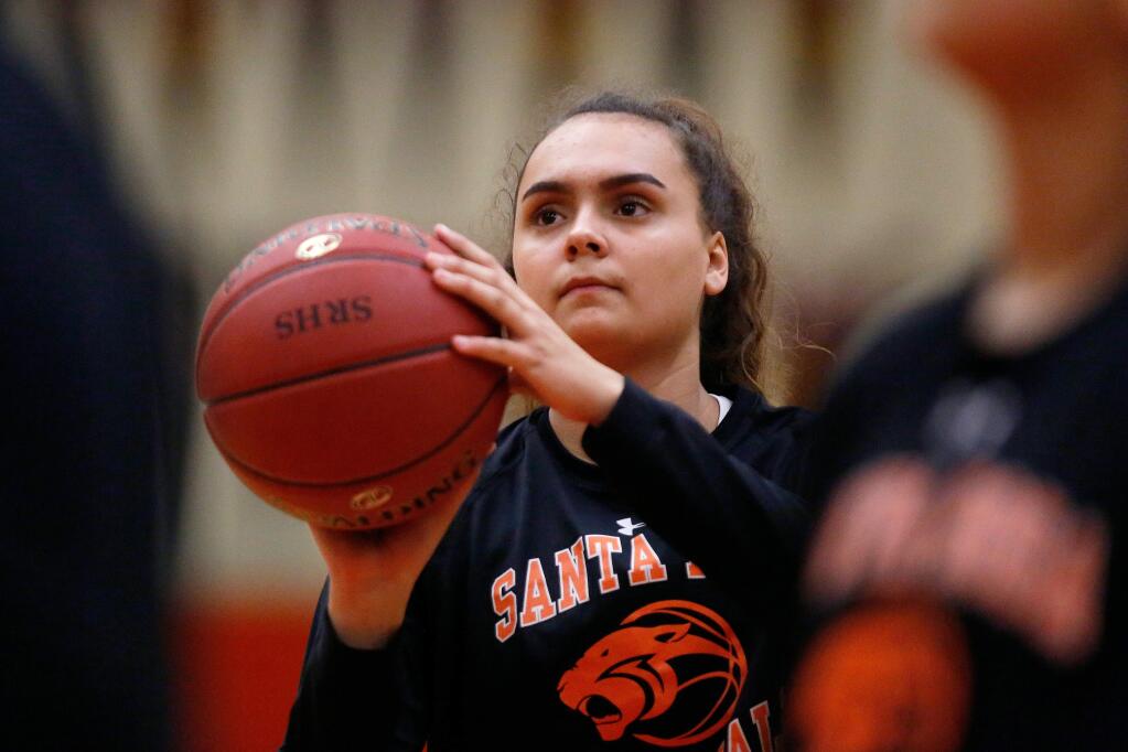 Santa Rosa Panthers' multi-talented point guard Emily Codding shoots during warmups before a girls varsity basketball game against the Ukiah Wildcats in Santa Rosa, California on Tuesday, February 7, 2017. (Alvin Jornada / The Press Democrat)