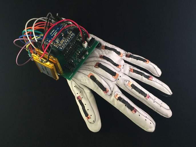 Researchers at UC San Diego developed a smart glove that can translate the American Sign Language alphabet as the wearer's fingers move, all for less than $100. (Timothy O'Connor/UC San Diego Jacobs School of Engineering)
