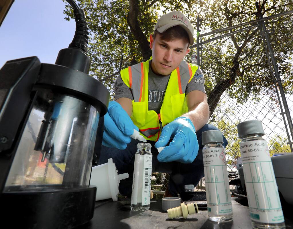 John Burgess /The Press DemocratGeologist Trevor Kent takes water samples from a well in Sonoma to test the quality after 500,000 gallons of service water were injected into the aquifer last week. The program hopes to use winter water surpluses to increase storage in depleted aquifers.