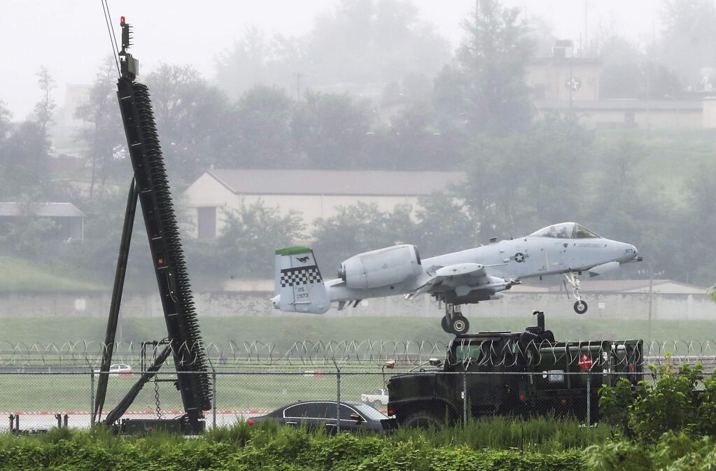 A U.S. Air Force A-10 Warthog lands on the runway at the Osan U.S. Air Base in Pyeongtaek, South Korea, Thursday, Aug. 10, 2017. North Korea on Wednesday officially dismissed President Donald Trump's threats of 'fire and fury,' declaring the American leader 'bereft of reason' and warning ominously, 'Only absolute force can work on him.' (Hong Ki-won/Yonhap via AP)