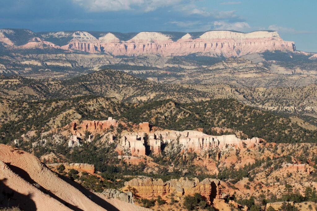 FILE- In this Aug. 15, 2014, file photo, Bryce Canyon National Park is shown in Bryce Canyon, Utah. The U.S. federal government announced Wednesday, Aug. 16, 2017, that it will eliminate a policy it put in place to allow national parks like Bryce Canyon to ban the sale of bottled water in an effort to curb litter. (AP Photo/Rick Bowmer, file)