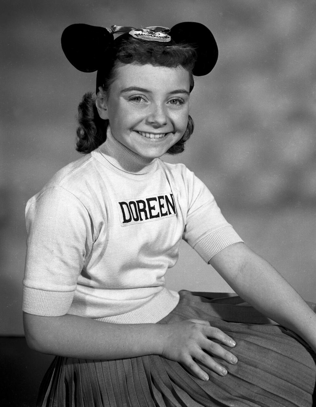 This undated photo released by Disney, shows Disney Mouseketeer Doreen Tracey. Tracey, a former child star who played one of the original cute-as-a-button Mouseketeers on 'The Mickey Mouse Club' in the 1950s, died from pneumonia on Wednesday, Jan. 10, 2018, at a hospital in Thousand Oaks, Calif., following a two-year battle with cancer, according to Disney publicist Howard Green. She was 74. (Disney via AP)