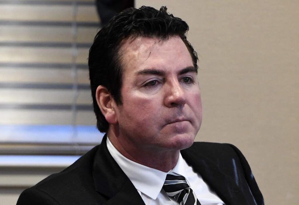 FILE - In this Oct. 18, 2017, file photo, Papa John's founder and CEO John Schnatter attends a meeting in Louisville, Ky. Papa John‚Äôs plans to pull Schnatter‚Äôs image from marketing materials after reports he used a racial slur. Schnatter apologized Wednesday, July 11, and said he would resign as chairman after Forbes reported that he used the slur during a media training session. Schnatter had stepped down as CEO last year after criticizing NFL protests. (AP Photo/Timothy D. Easley, File)