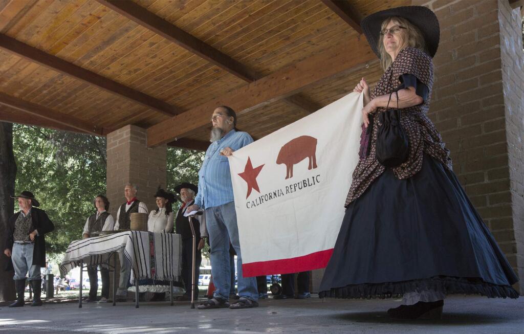 The Bear Flag players, led by George Webber, re-enact the Bear Flag Revolt in the Grinstead Amphitheater on Sunday, June 10. The play commemorated the June 1846 rebellion against the Mexican government, who then ruled California, and the capture of Sonoma led by a small group of American settlers who then proclaimed California an independent republic. However, soon after the Bear Flag was hoisted, the U.S. military began occupying California, and in three weeks, replaced the Bear Flag with the Stars and Stripes, thus ending the short-lived republic. California joined the union in 1850. (Photo by Robbi Pengelly/Index-Tribune)