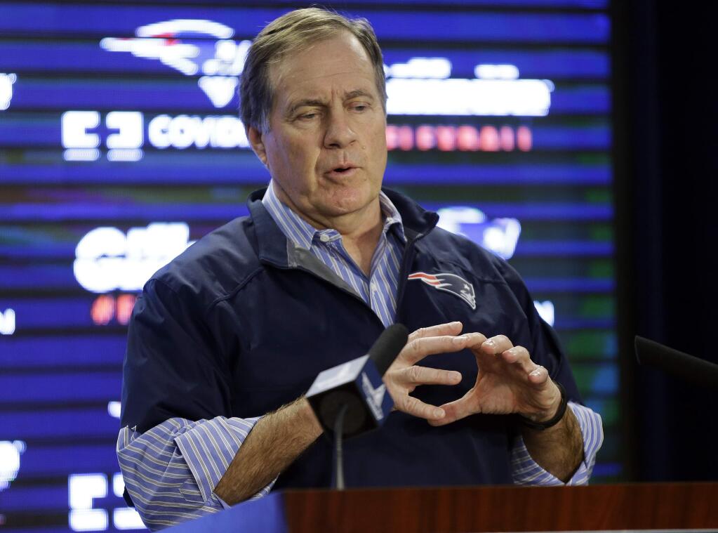 New England Patriots football head coach Bill Belichick speaks during an NFL football news conference at Gillette Stadium, Saturday, Jan. 24, 2015, in Foxborough, Mass., where he defended the way his team preps its game balls. (AP Photo/Steven Senne)