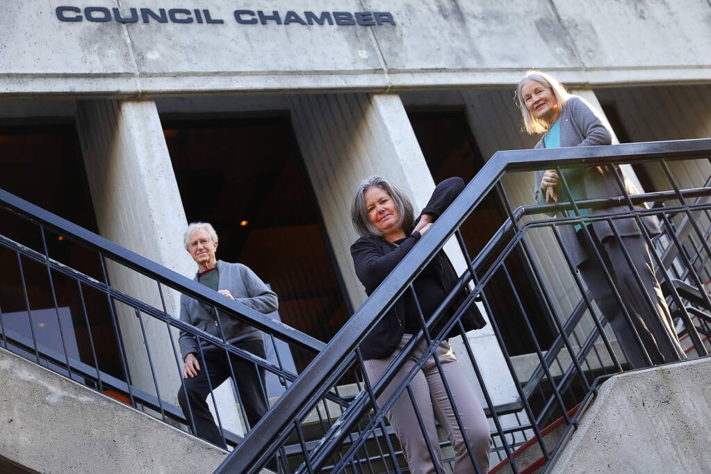 Friends of Public Banking Santa Rosa founder Shelly Browning, center, and her colleagues Debora Hammond, right, and Philip Beard, left, are pushing for a public bank for the City of Santa Rosa(Christopher Chung/ The Press Democrat)
