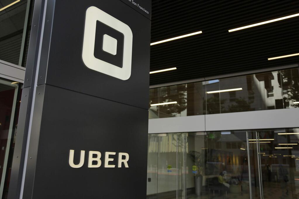 FILE - This Wednesday, June 21, 2017, file photo shows the building that houses the headquarters of Uber, in San Francisco. Transport for London says it won't renew a license for Uber to operate in the British capital. (AP Photo/Eric Risberg, File)