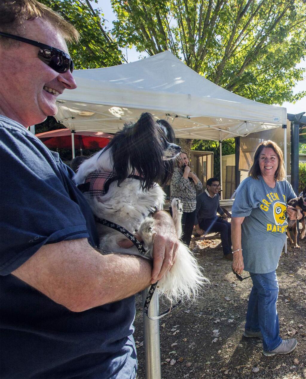 On the feast of St. Francis of Assisi, the patron saint of animals, locals brought their pets to Pets Lifeline for a blessing from Father Alvin, from St. Francis Solano Catholic Church (not shown). Pets Lifeline won a lenghty process to change from a non-conforming pet shelter to a conforming one, and plans to begin remodelling later this year. (Photo by Robbi Pengelly/Index-Tribune)