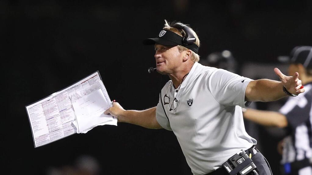 In this Sept. 10, 2018, file photo, Oakland Raiders head coach Jon Gruden gestures on the sideline during the second half against the Los Angeles Rams in Oakland. (AP Photo/John Hefti, File)