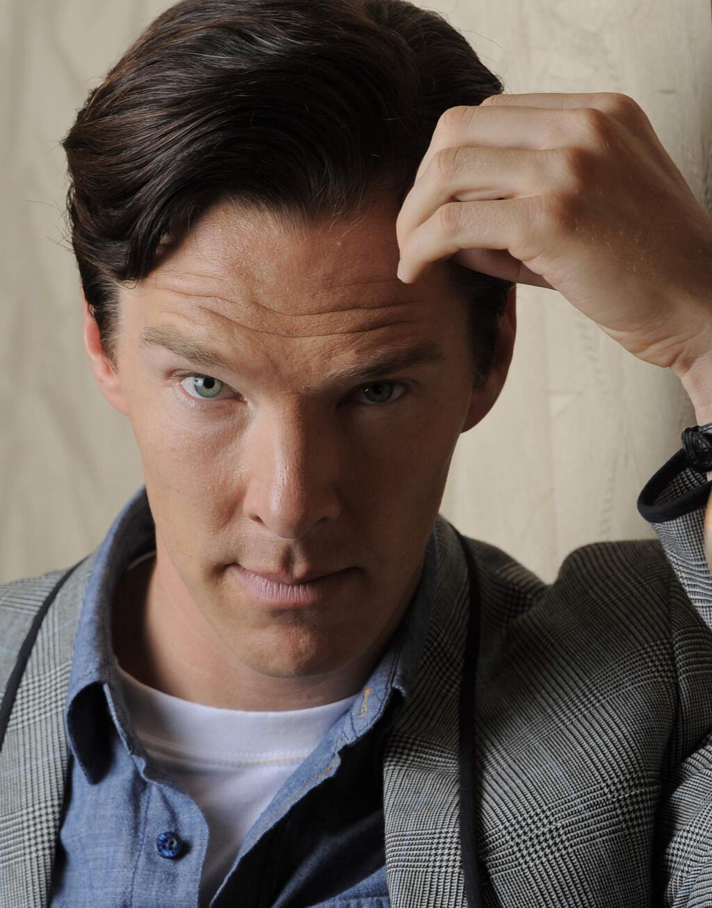 FILE - In this Sept. 8, 2013 file photo, actor Benedict Cumberbatch poses for a portrait during the 2013 Toronto International Film Festival in Toronto. Cumberbatch stars as Alan Turning, a World World II code breaker in 'The Imitation Game.' (Photo by Chris Pizzello/Invision/AP, File)