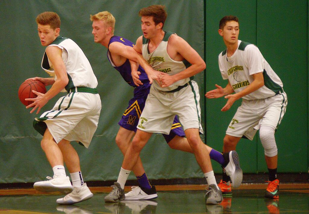 SUMNER FOWLER/FOR THE ARGUS-COURIERCasa Grande's Gauchos go three-on-one against a a lone Middletown defender in a scrimmage at Casa Tuesday night.