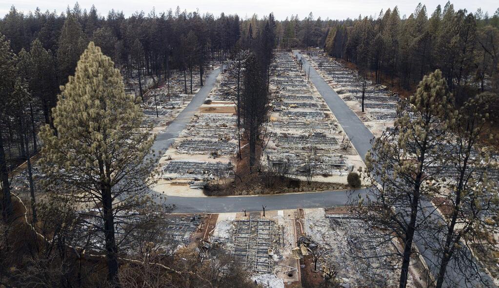 File - In this Dec. 3, 2018, file photo, are homes leveled by the Camp fire line the Ridgewood Mobile Home Park retirement community in Paradise, Calif. (AP Photo/Noah Berger)