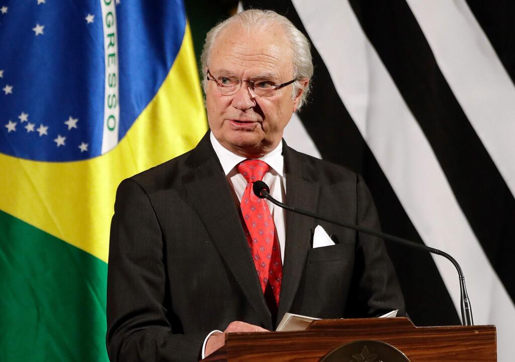 FILE - In this Monday, April 3, 2017 file photo, King Carl Gustaf of Sweden speaks during a meeting with Brazilian and Swedish businessmen, in Sao Paulo, Brazil. Sweden's king on Wednesday, April 11, 2018 the resignation of three members from the Swedish Academy awarding the Nobel Literature Prize is 'deeply unfortunate and risk seriously damaging' the body's 'important activities.' (AP Photo/Andre Penner, file)