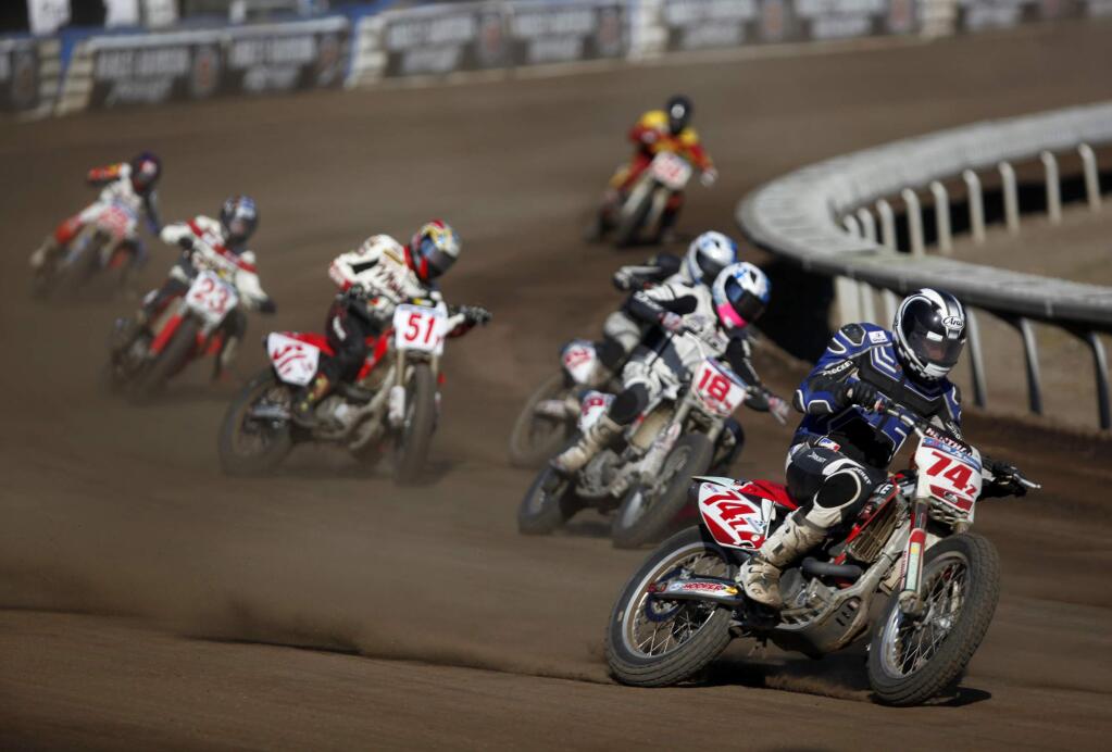 AMA Pro Flat Track racers compete in a 12 lap Pro Singles race at the Sonoma County Fairgrounds on Sunday, September 30, 2012 in Santa Rosa, California. (BETH SCHLANKER/ The Press Democrat)