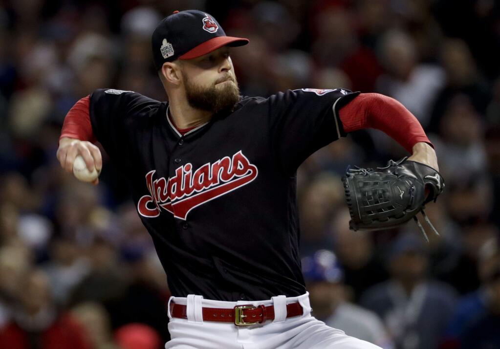 Cleveland Indians starting pitcher Corey Kluber throws against the Chicago Cubs during the first inning of Game 1 of the World Series Tuesday, Oct. 25, 2016, in Cleveland. (AP Photo/Matt Slocum)