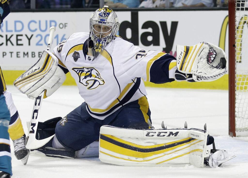 Nashville Predators goalie Pekka Rinne stops a shot during the first period of Game 1 in an NHL hockey Stanley Cup Western Conference semifinal series against the San Jose Sharks Friday, April 29, 2016, in San Jose, Calif. (AP Photo/Marcio Jose Sanchez)
