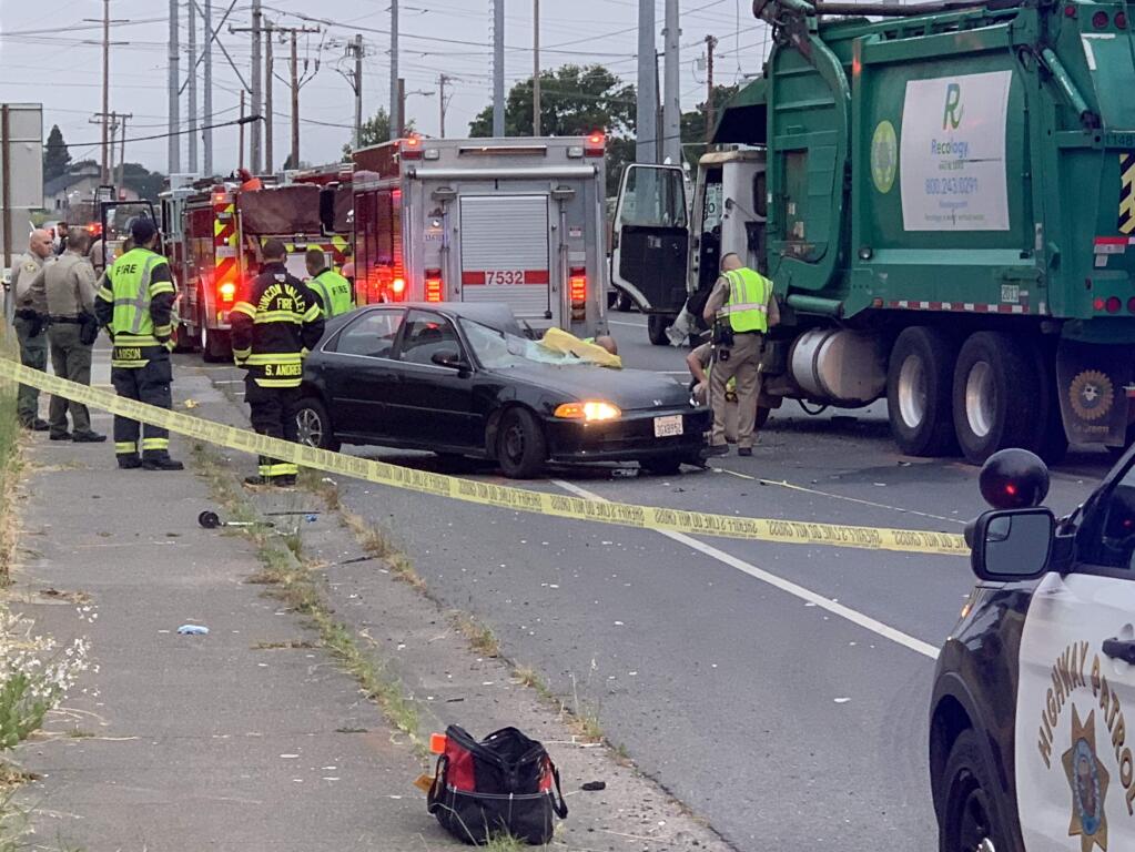A driver was killed after crashing into an oncoming garbage truck on River Road early Friday, May 10, 2019. (DAVE CANNON)