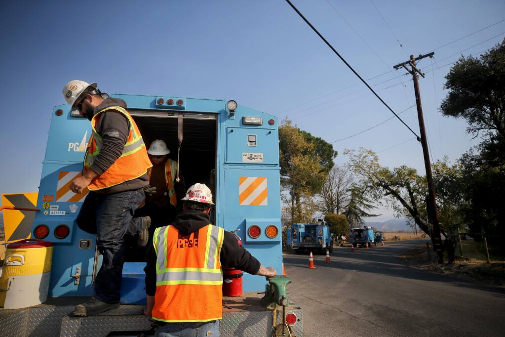 PG&E crewman work to repair a gas line on Lytton Station Road in Geyserville on Wednesday, Oct. 30, 2019. (BETH SCHLANKER/ PD)