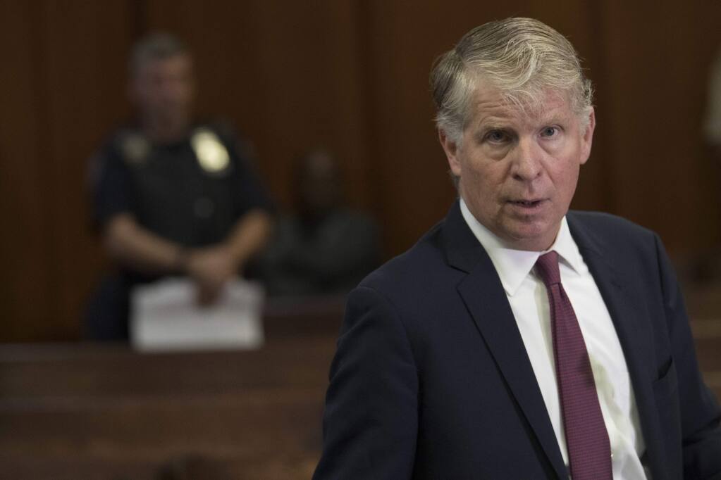 FILE - In this Sept. 12, 2018 file photo, Manhattan District Attorney, Cyrus Vance, Jr., speaks to reporters after a hearing in Manhattan criminal court in New York. Vance is entering his final weeks as Manhattan district attorney. (AP Photo/Mary Altaffer, File)