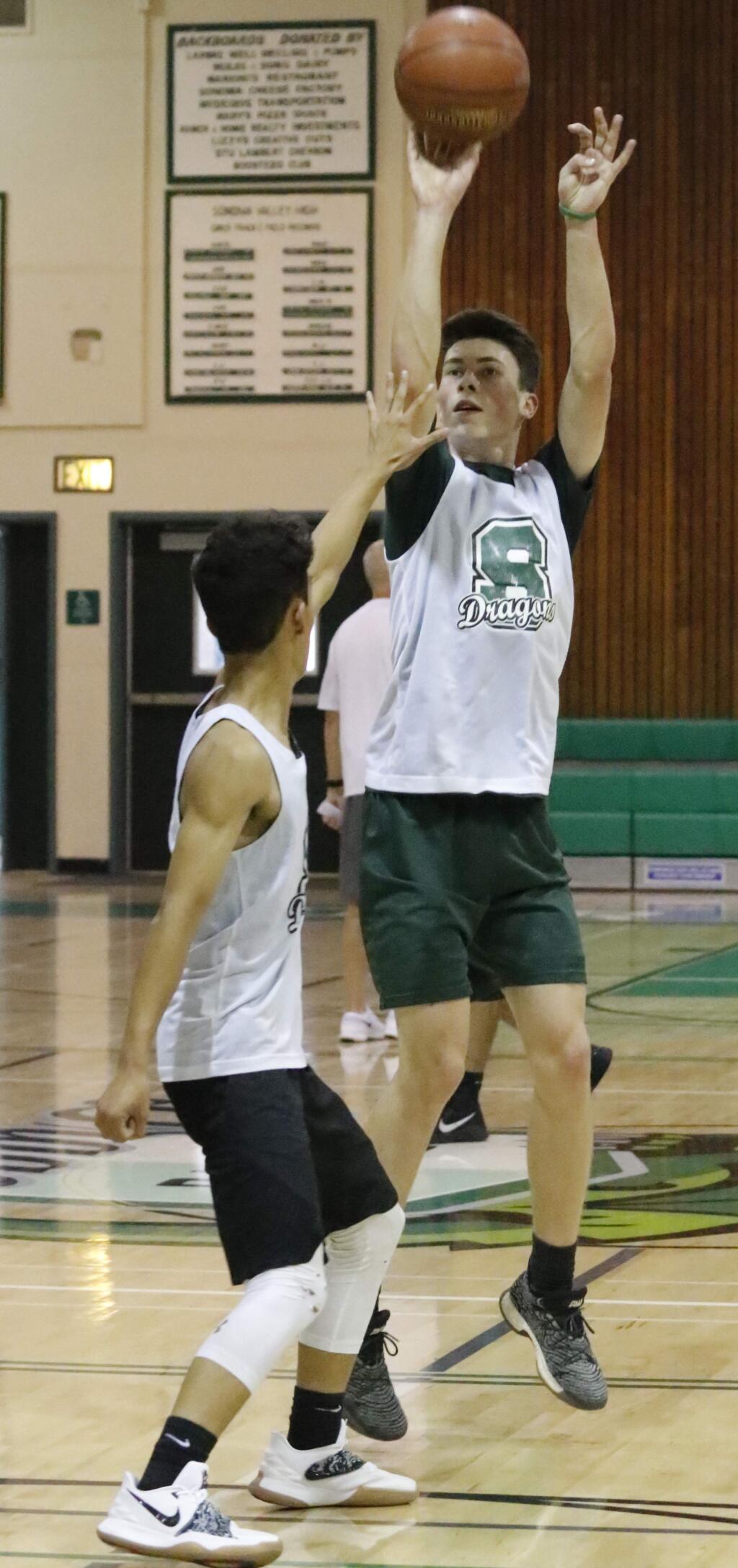 Bill Hoban/Special to the Index-TribuneSonoma's Luke Sendaydiego, left, and Jack Boydell, right, perform a shooting drill last week. The Dragons have a scrimmage scheduled for Saturday at Healdsburg.