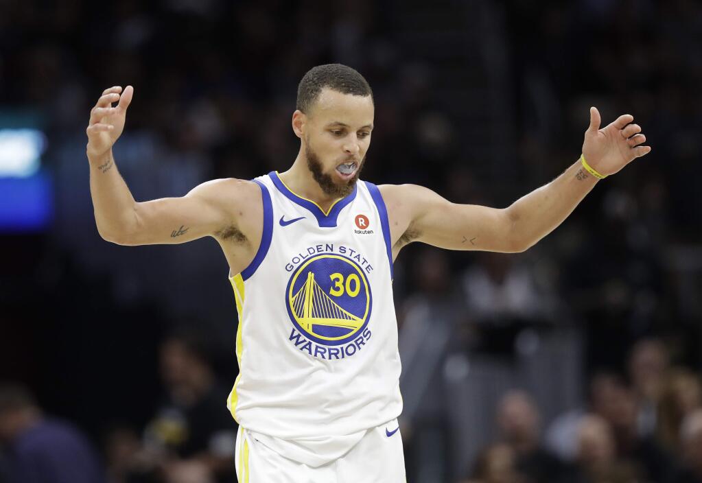 Golden State Warriors' Stephen Curry celebrates in the second half of Game 4 of the NBA Finals against the Cleveland Cavaliers, Friday, June 8, 2018, in Cleveland. (AP Photo/Tony Dejak)