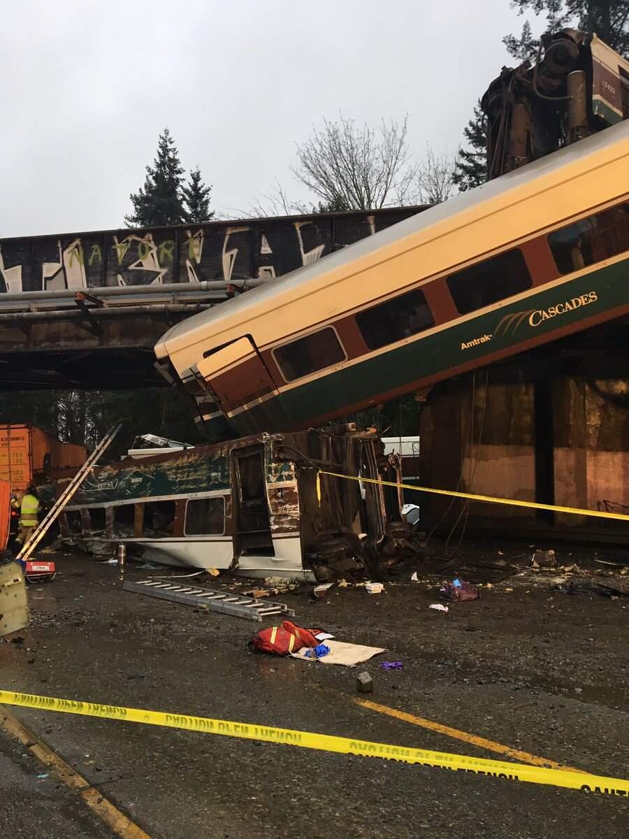 This photo provided by Washington State Patrol shows an Amtrak train that derailed south of Seattle on Monday, Dec. 18, 2017. Authorities reported 'injuries and casualties.' The train derailed about 40 miles (64 kilometers) south of Seattle before 8 a.m., spilling at least one train car on to busy Interstate 5. (Washington State Patrol via AP)
