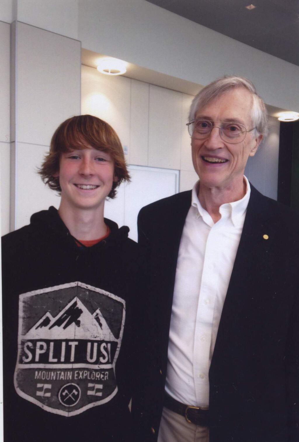PHOTO: 1 by Baxter family photoMontgomery High School sophomore Leif Baxter is shown with Nobel Prize Winner John C. Mather in Boston.