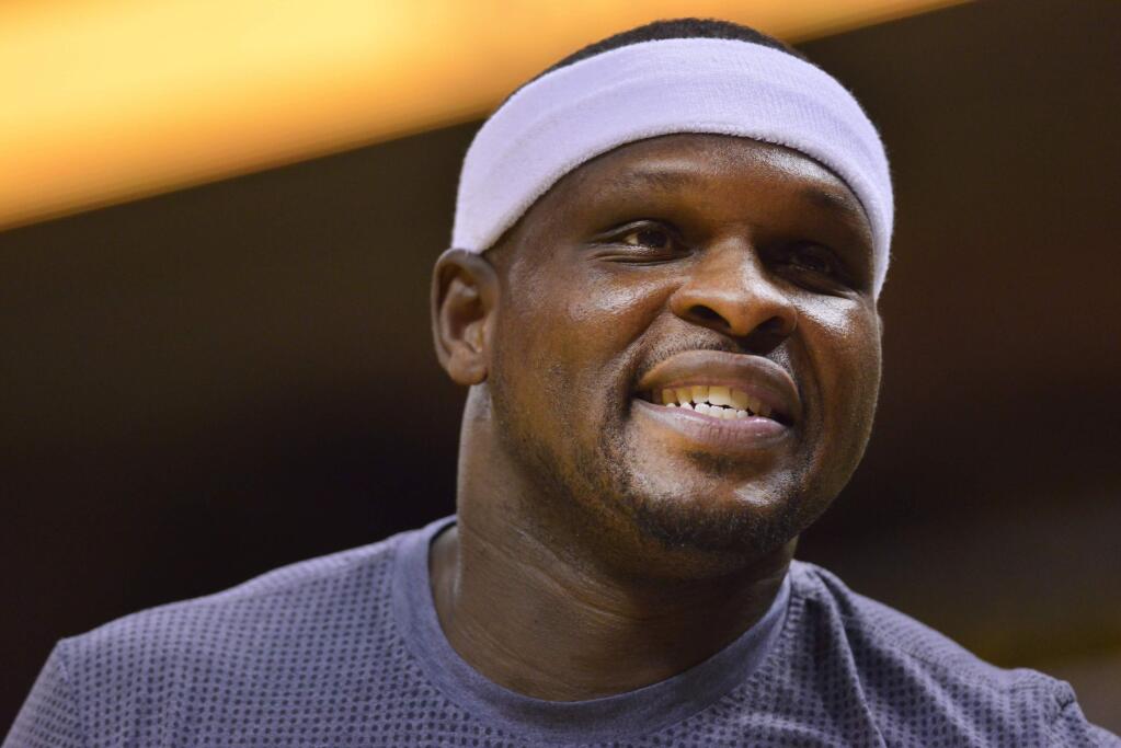FILE - In this April 27, 2017, file photo Memphis Grizzlies forward Zach Randolph warms up before an NBA basketball game against the San Antonio Spurs in Memphis, Tenn. Police say Randolph was arrested on a marijuana charge after several police cars were vandalized when a large gathering became unruly at a Los Angeles housing project on Wednesday, Aug. 9, 2017. Randolph was taken into custody on suspicion of possession of marijuana with intent to sell. (AP Photo/Brandon Dill,File)