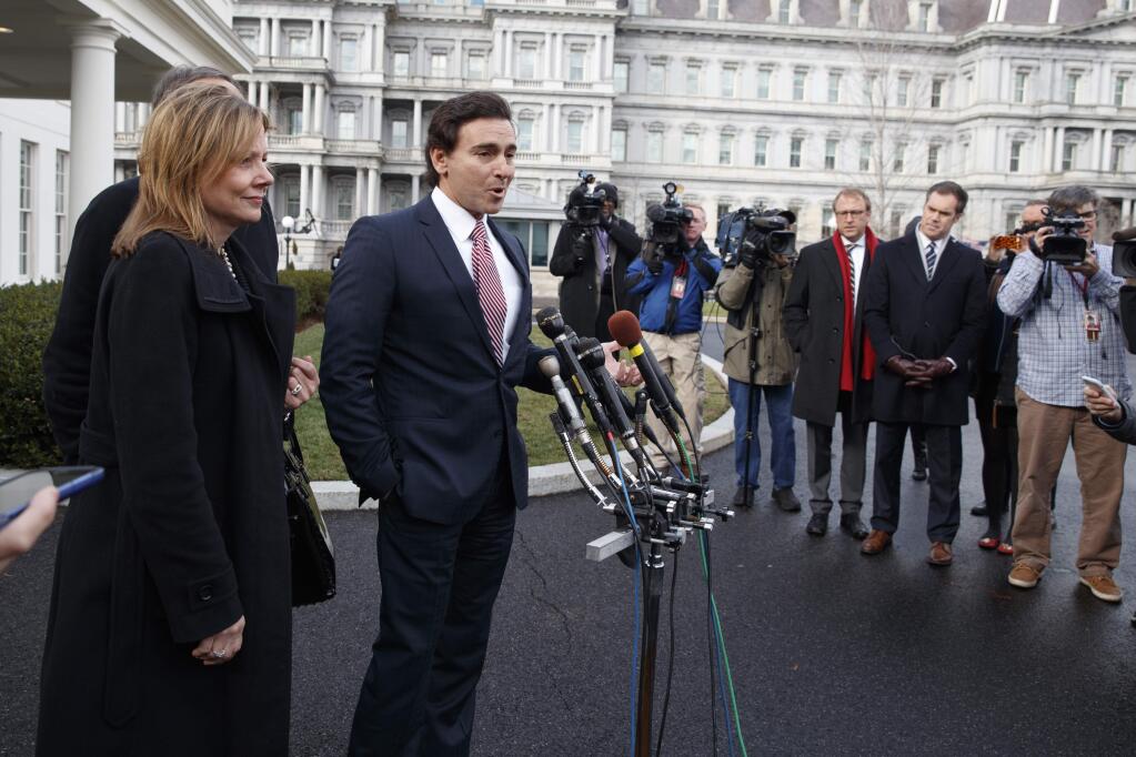 Ford Motors CEO Mark Fields, right, and GM CEO Mary Barra meet with reporters outside the White House in Washington, Tuesday, Jan. 24, 2017, following a meeting with President Donald Trump in the Roosevelt Room. (AP Photo/Evan Vucci)