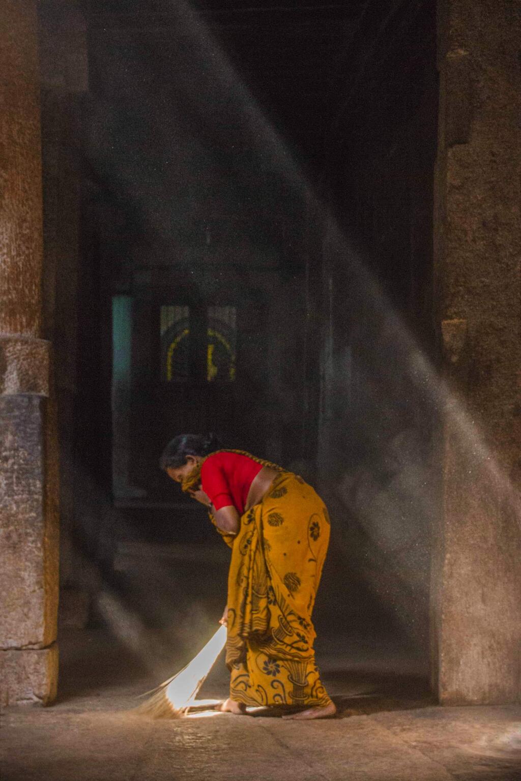This photo of a woman sweeping was shot by Kaeti Bailie during a trip to India led by photographer Ron Zak. It is one of the photos that are on display at the Sonoma Community Center's Gallery 212.