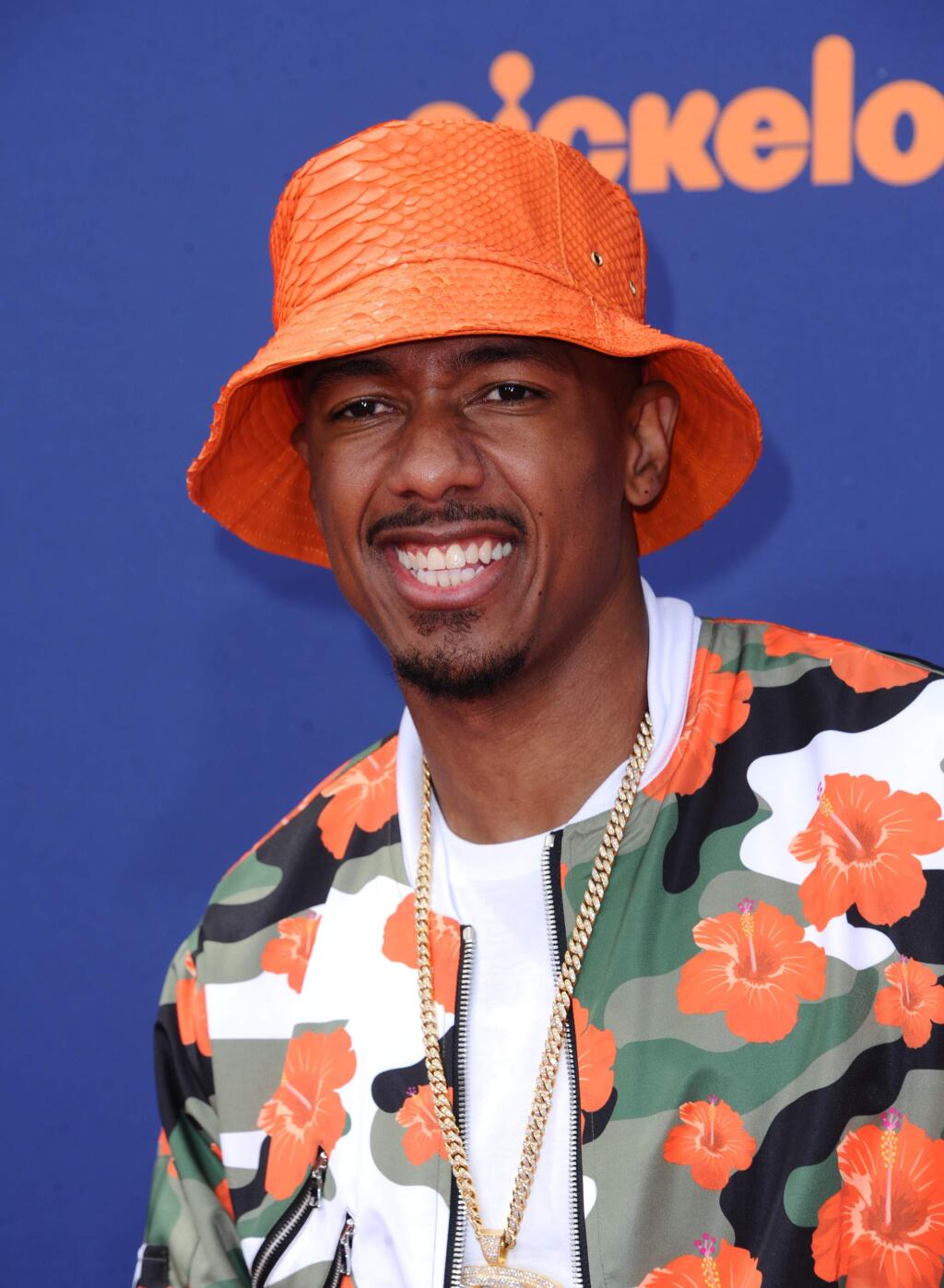 Nick Cannon arrives at the 2015 Kids' Choice Sports Awards at Pauley Pavilion on Thursday, July 16, 2015 in Los Angeles. (Photo by Richard Shotwell/Invision/AP)
