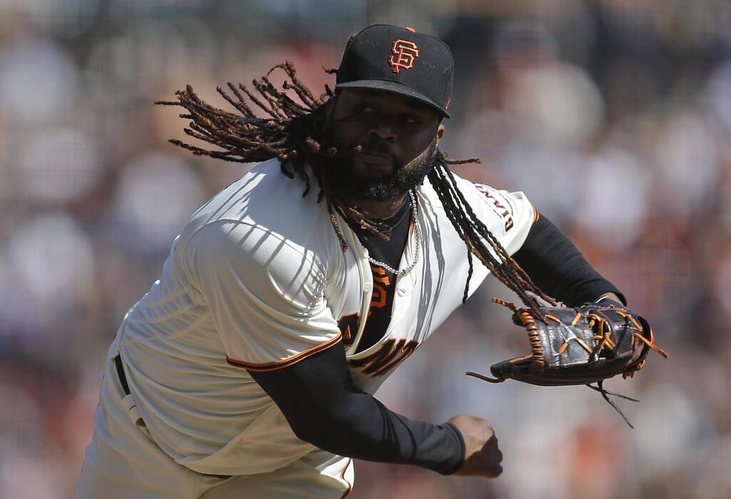 San Francisco Giants pitcher Johnny Cueto works against the San Diego Padres in the second inning of a baseball game Sunday, Oct. 1, 2017, in San Francisco. (AP Photo/Ben Margot)