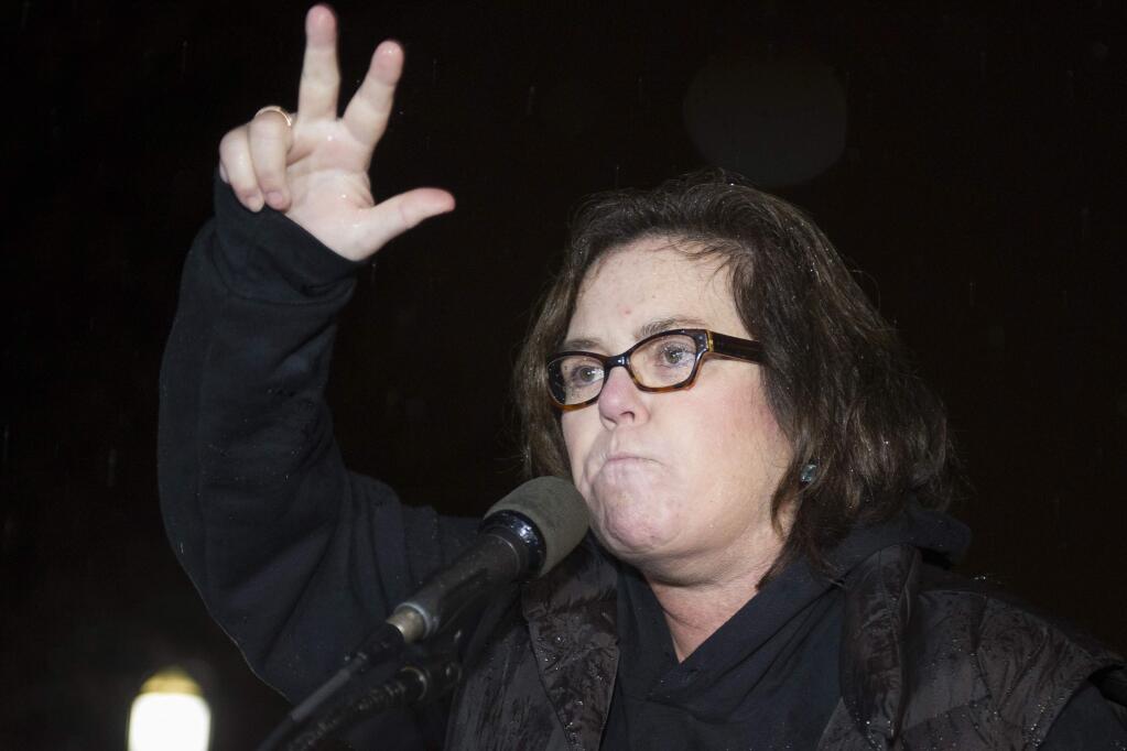 FILE - In this Feb. 28, 2017 file photo, Rosie O'Donnell speaks at a rally calling for resistance to President Donald Trump in Lafayette Park in front of the White House in Washington, prior the president's address to a joint session of Congress. When President Donald Trump called porn actress Stormy Daniels ‚Äúhorseface‚Äù on Twitter, he added to his long list of creative, some say misogynistic, descriptions for women. A look at how Trump‚Äôs words, and his attitude, might play out three weeks before an election that features a record number of women candidates. (AP Photo/Cliff Owen, File)