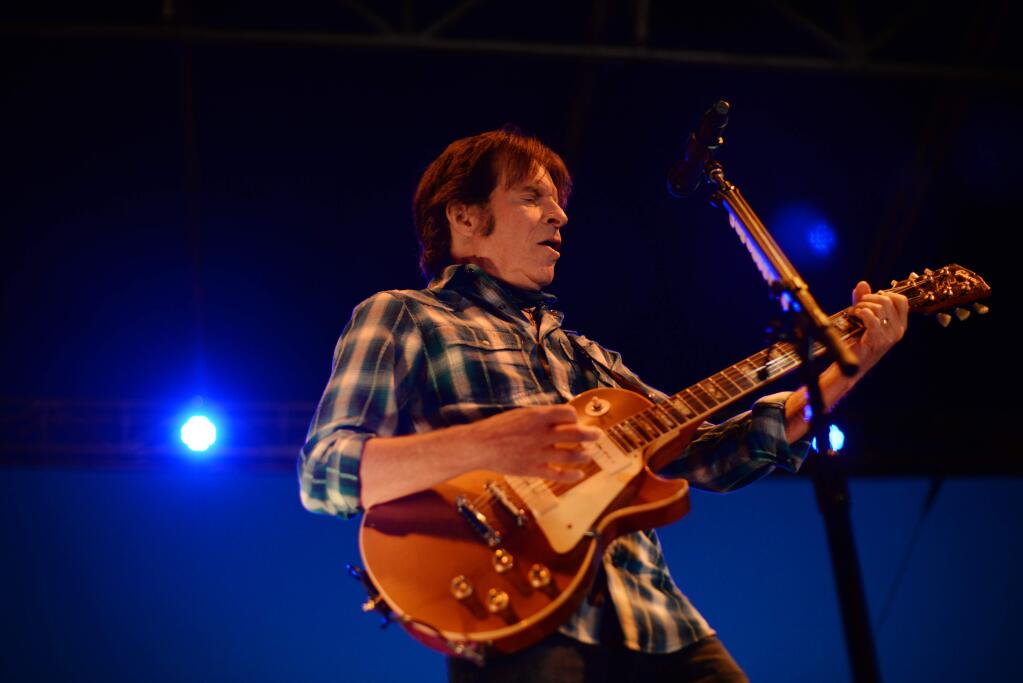 Rock & Roll Hall of Famer John Fogerty performing during the NorCal wildfire relief fundraiser held at Hamel Family Wines in Sonoma Saturday. Fogerty charmed the audience with a story about playing after the Grateful Dead during Woodstock then followed the story with his hit song 'Who'll Stop the Rain.' The evening raised $1.2 million for fire victim relief. November 11, 2017.(Photo: Erik Castro/for The Press Democrat)
