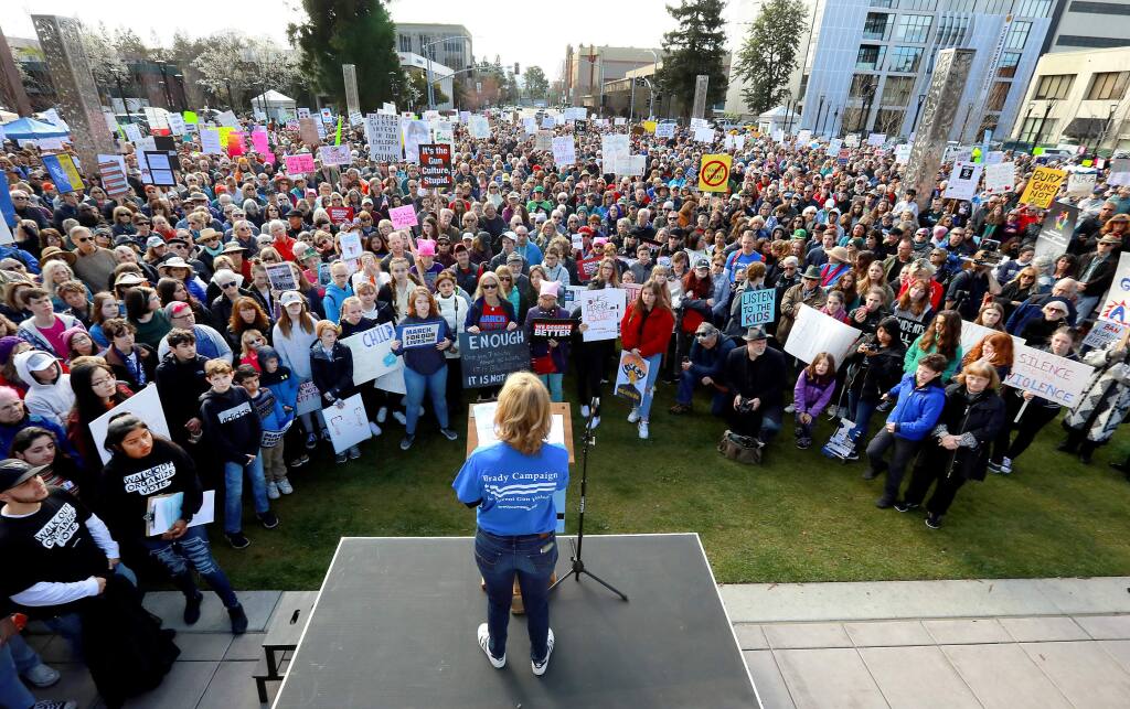 About 2,000 people gathered in Courthouse Square in Santa Rosa on Saturday to protest gun-violence as part of a national series of demonstrations including Washington D.C. (Photo by John Burgess/The Press Democrat)