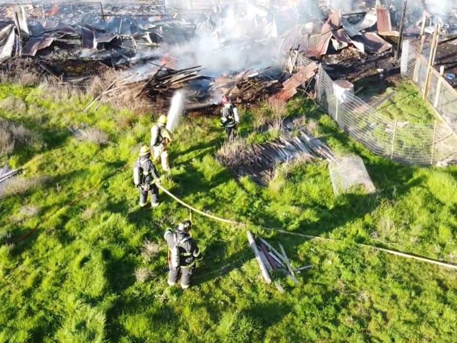 A fire destroyed a pair of century-old redwood chicken barns near Sebastopol, Tuesday, Feb. 25, 2020. (Gold Ridge Fire Protection District Battalion Chief Gino Degraffenreid)