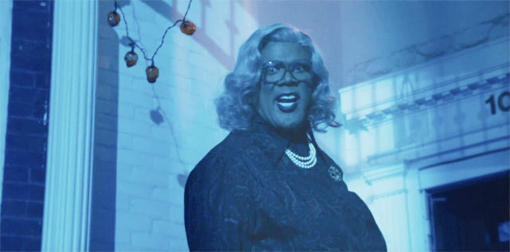 Madea (Tyler Perry) spends Holloween fending off killers, paranormal poltergiests, ghosts, ghouls and zombies while keeping a watchful eye on a group of misbehaving teens in 'Boo! A Madea Halloween.' (LIONSGATE)