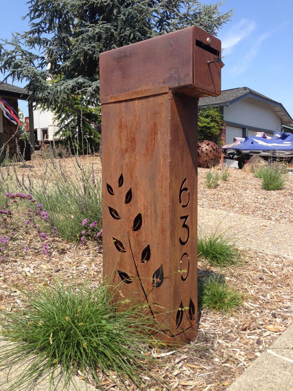David Fowler DesignsIn addition to landscape sculptures, lighting and gates, Santa Rosa landscape designer and sculptor David Fowler creates items such as this mailbox with address number. Mailboxes and Address numbers. 'Little touches go a long way towards making our homes and businesses stand apart and away from the crowd. Custom cut address numbers are an affordable and easy way to add a sophisticated look to your home. I can also create the mailbox of your dreams out of steel,' says Fowler.
