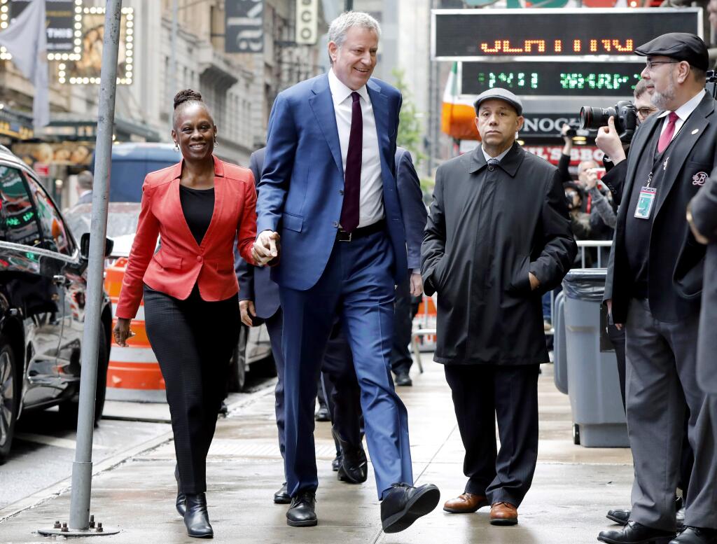 New York Mayor Bill de Blasio and his wife Chirlane McCray arrive at 'Good Morning America' in New York, Thursday, May 16, 2019. De Blasio announced Thursday that he will seek the Democratic nomination for president, adding his name to an already long list of candidates itching for a chance to take on Donald Trump. (AP Photo/Richard Drew)