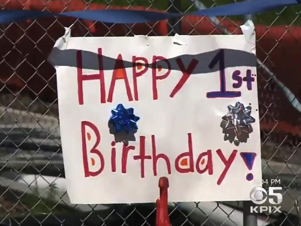 A giant sinkhole east of San Francisco got a balloon, streamers and a hand-lettered sign wishing it a 'Happy 1st Birthday.' (CBS video)