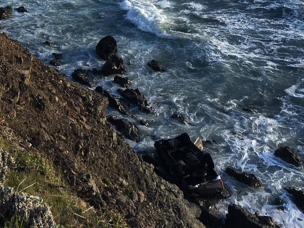 A GMC careened off a Mendocino Coast cliff, killing two adults and three children, Monday, March 26, 2018. (CHP)